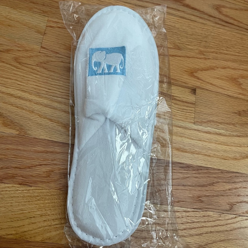White Slippers with Blue Elephant Logo Nantucket White Elephant Hotel